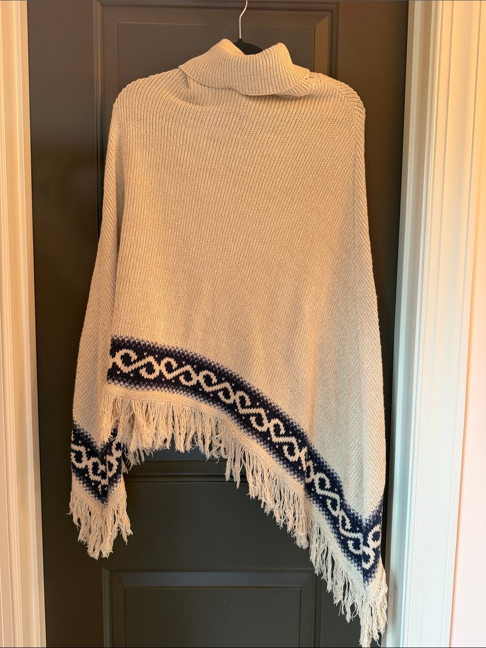 Northern Reflections Cream Poncho with Navy Patterned Trim 100% cotton